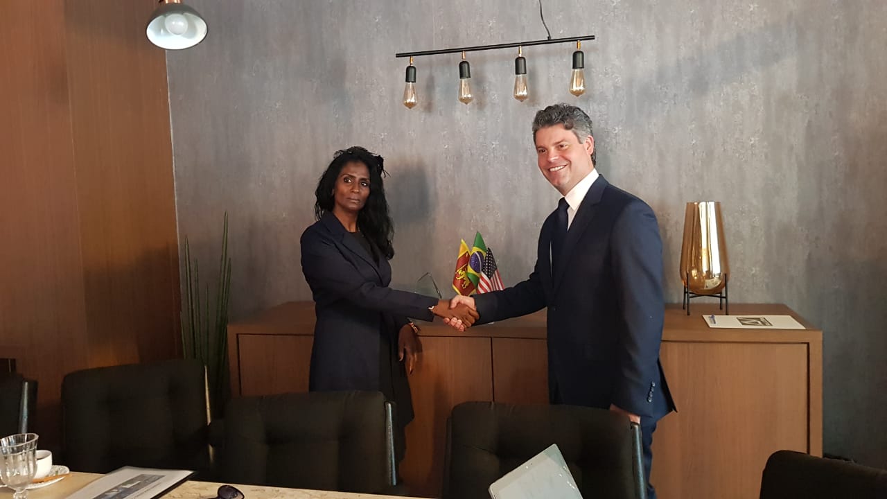 With Dr. Estevan Pegoraro, USA, Brazil and Sri Lanka flags